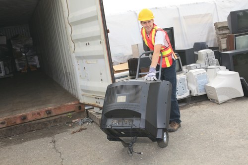 Crew sorting skip contents in line with borough waste separation